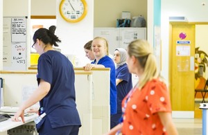 Female healthcare workers working in a busy hospital