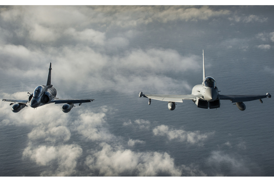 A French Air Force Mirage 2000N (left) and a Royal Air Force Typhoon