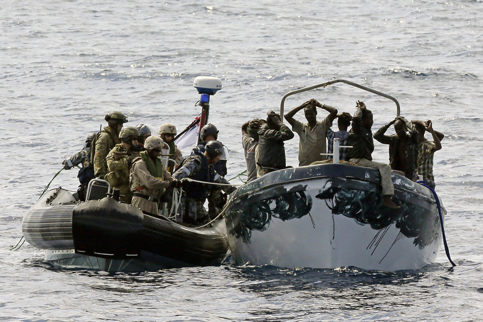 HMAS Melbourne's boarding party intercepts a suspected pirate boat 