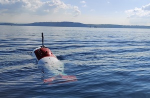 The eXtra Large Unmanned Underwater Vehicle (XLUUV) partially submerged in the sea