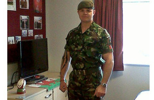 Lance Sergeant Dewi Ahearne in his new bedroom at Hounslow Barracks.