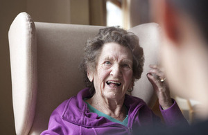 Mature woman in chair