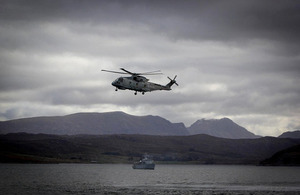 HMS Cattistock on Loch Ewe with a Merlin helicopter overhead during Exercise Joint Warrior [Picture: Crown copyright]
