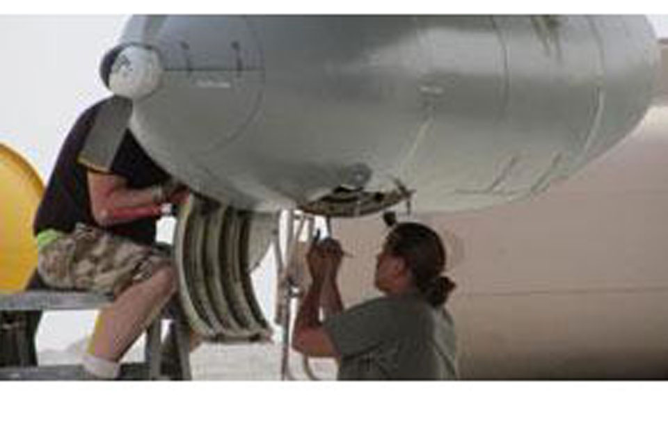 Corporal Buzz Jordan and Senior Aircraftwoman (Technician) Sarah Meek at work