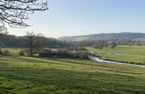 The rolling hills of the Mole Valley near Reigate can be seen under bright blue skies