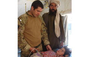 Corporal Aran Rushe with Sheefa and her father