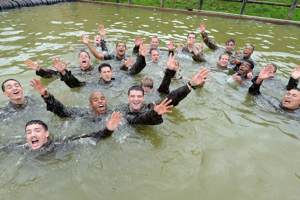 Commando gunners and US Marines on the Bottom Field assault course