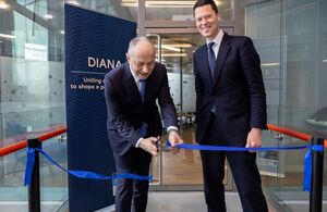 Minister for Defence Procurement and Deputy Nato Secretary General cutting a ribbon at the DIANA headquarters.