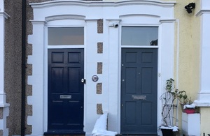Front doors to two terraced houses.