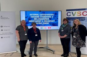 A photograph of Wales Council for Voluntary Action and County Voluntary Councils representatives at a safeguarding roadshow in Conwy