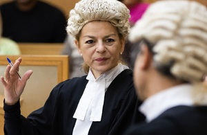 Barristers in courtroom discussion
