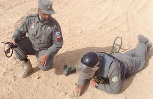 Captain Muhammad oversees another student from his team