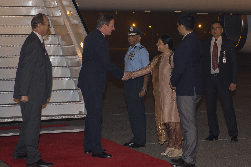 David Cameron getting off the plane on his visit to India.