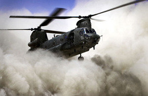An RAF Chinook helicopter throws up dust clouds during landing (library image) [Picture: Petty Officer Hamish Burke, Crown copyright]