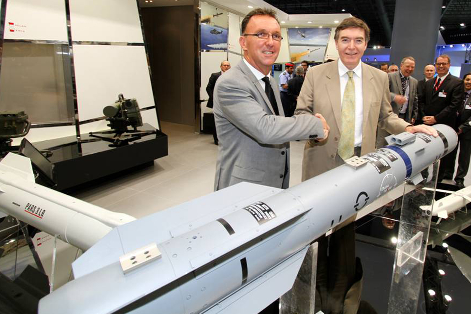 Philip Dunne (right) with a Brimstone missile