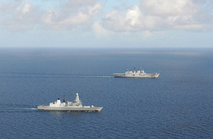 HMS Daring (front) and HMS Illustrious [Picture: Leading Airman (Photographer) Nicky Wilson, Crown copyright]