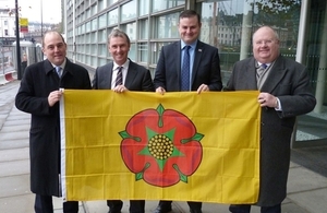 Left to right: Ben Wallace, Nigel Evans, Andrew Stephenson and Eric Pickles with the Lancashire flag.