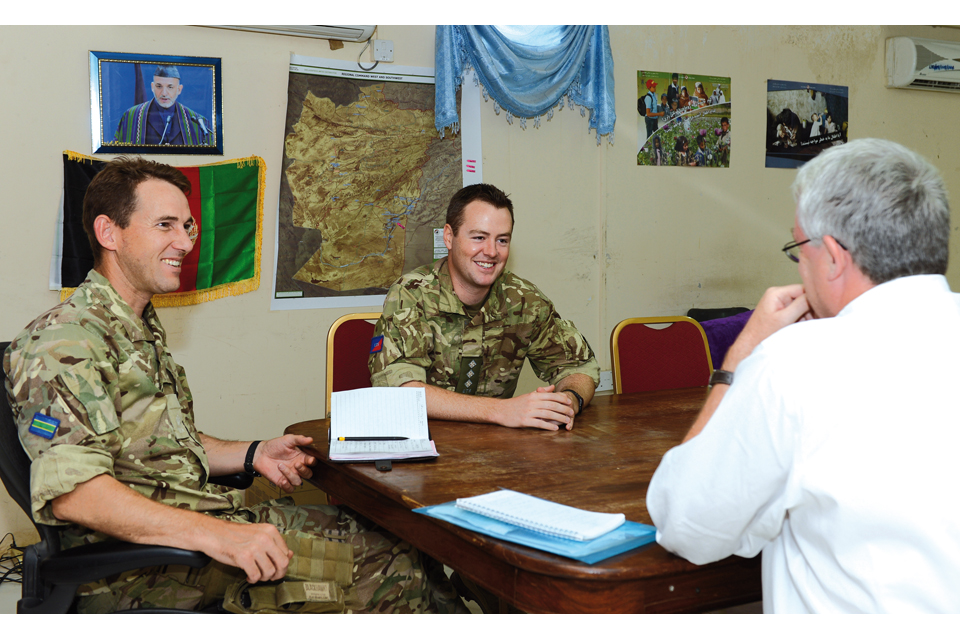 Ian Carr speaks with Major Will Miller (left) and Captain Matt Eade