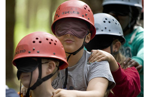 Children at the Ability Outdoors centre in Dalby Forest taking part in confidence and team-building activities