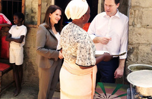 Photograph of Lynne Featherstone seeing a clean cookstove in Mozambique