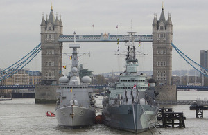 Belgian frigate Louise-Marie, carrying the 70 sandbags of 'sacred soil', arrives alongside HMS Belfast at Tower Bridge [Picture: Petty Officer (Photographer) Derek Wade, Crown copyright]