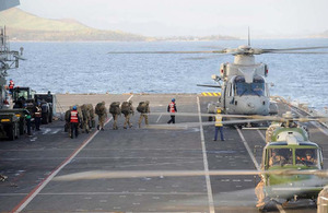 Flight deck operations aboard HMS Illustrious in the Philippines [Picture: Leading Airman (Photographer) Nicky Wilson, Crown copyright]