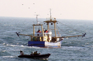 HMS Mersey's boarding team approaches Dutch fishing vessel the FV Elizabeth to carry out an inspection