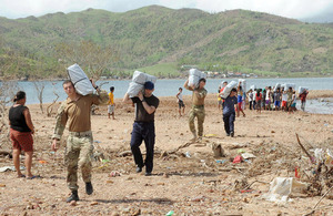 Delivering supplies to a village in the Philippines [Picture: Leading Airman (Photographer) Nicky Wilson, Crown copyright]