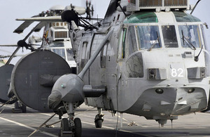 A Sea King from 857 Naval Air Squadron on the deck of HMS Ocean during Op ELLAMY