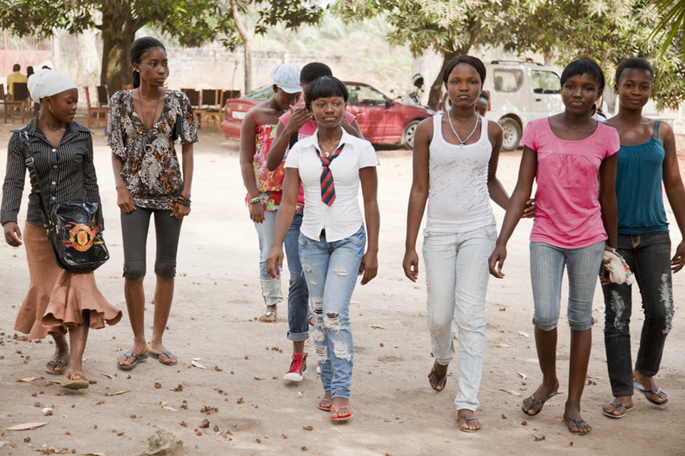 A group of girls walk to an after school club in Sierra Leone. Picture: Plan UK