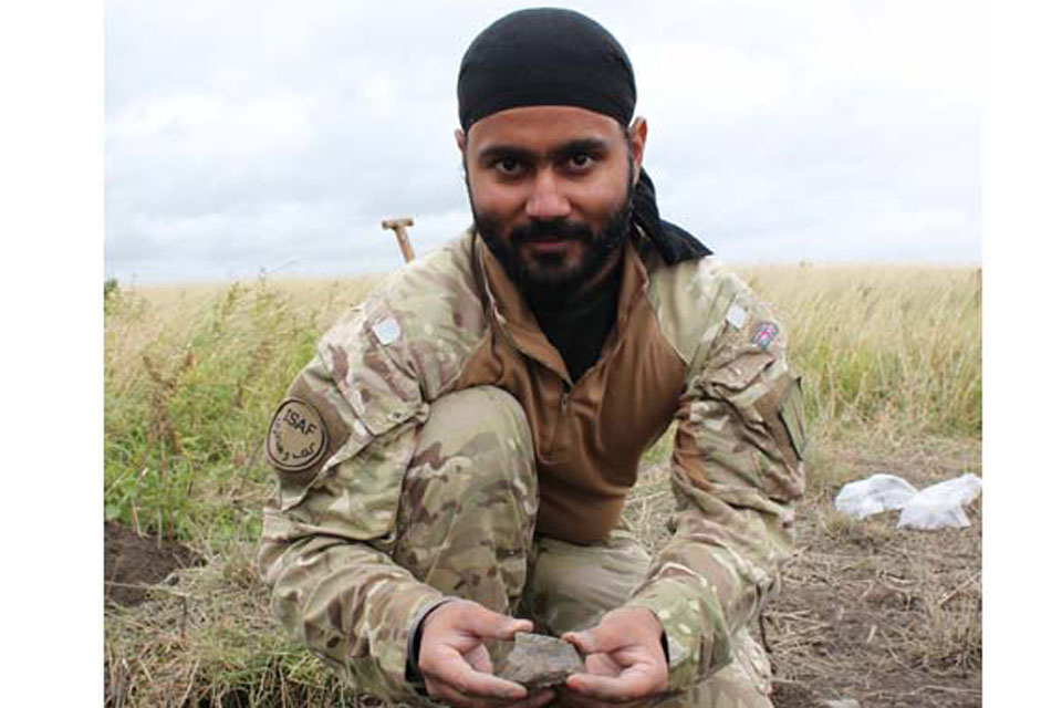 A Rifleman's spoils from the dig include Iron Age pottery 