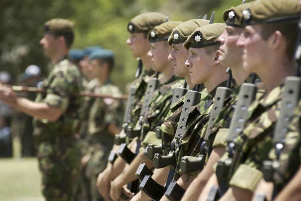Soldiers standing guard as the UK hands over ISAF leadership to Turkey.