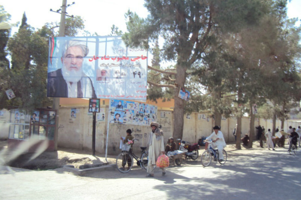 Parliamentary election campaign posters in a Lashkar Gah street.