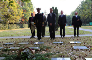 Paying respect at graveside