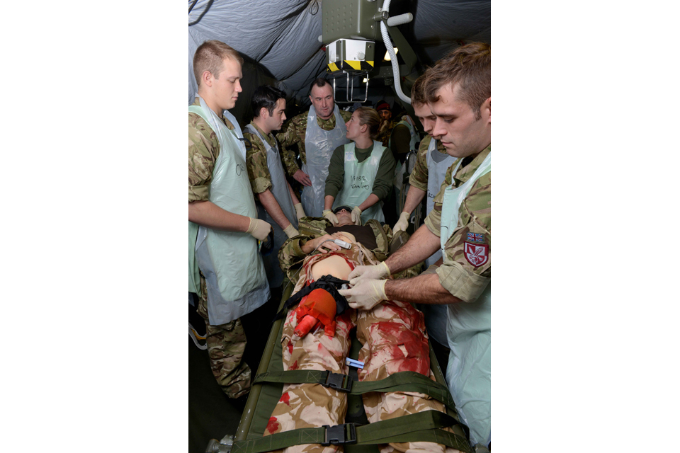 Medics treating a simulated casualty during Exercise Serpent's Anvil 
