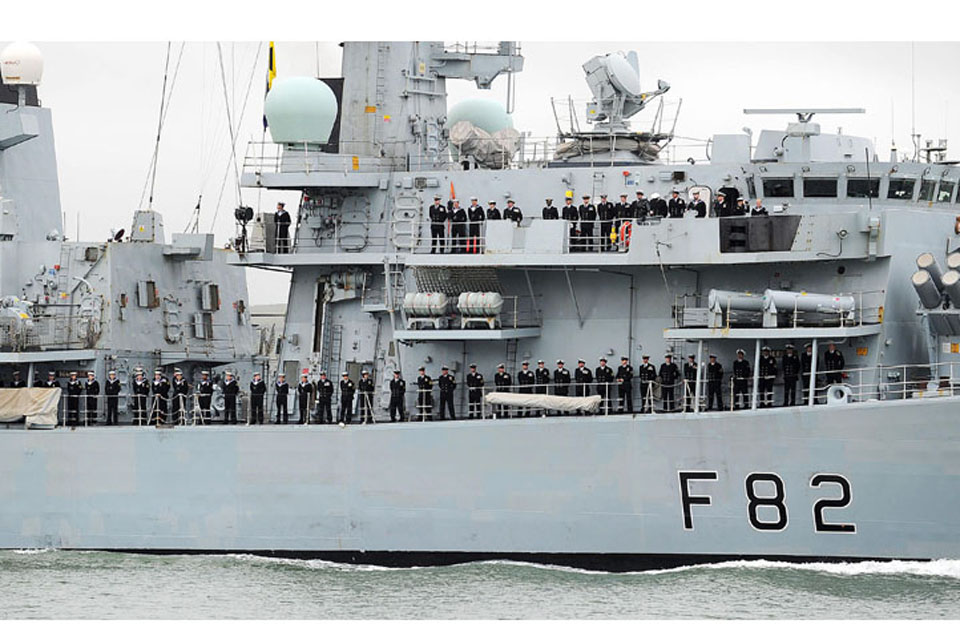 HMS Somerset's crew perform 'Procedure Alpha' as she sails into HM Naval Base Devonport  