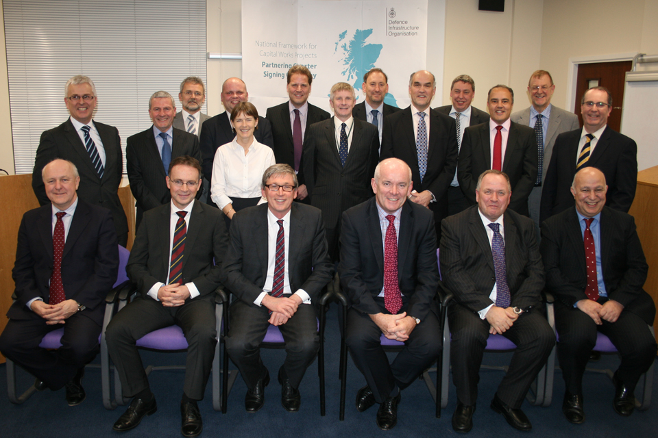 DIO personnel with representatives from the 5 successful bidders 
