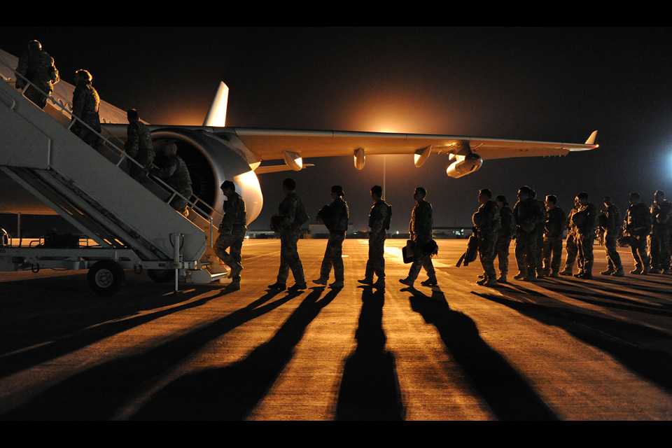 Homebound troops boarding the Voyager aircraft at Camp Bastion