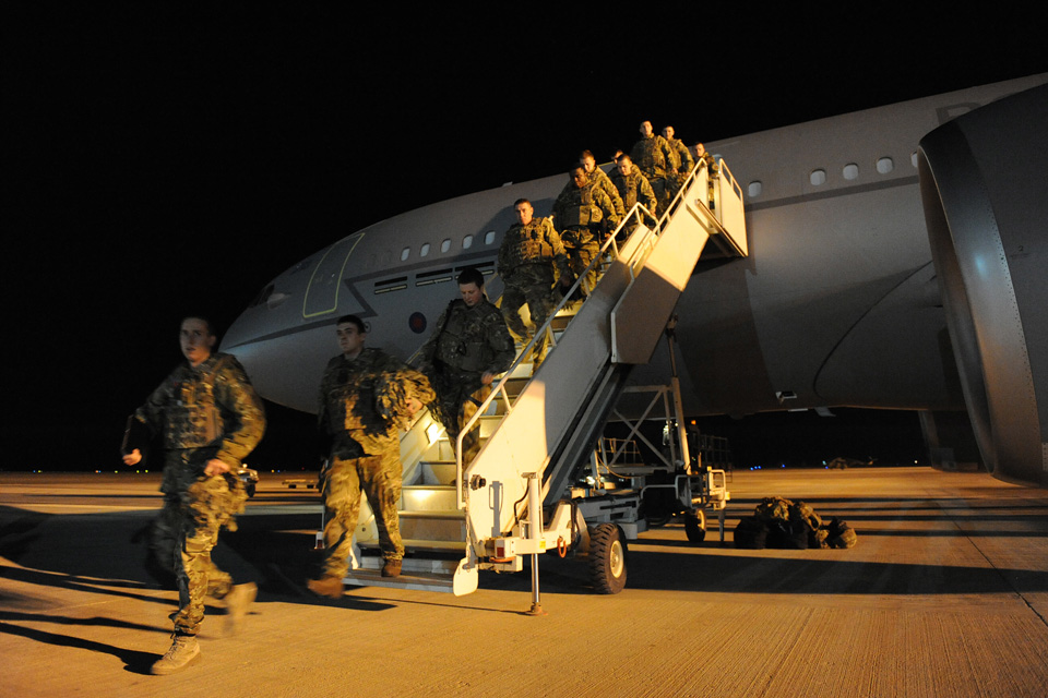 Service personnel disembark the RAF Voyager aircraft