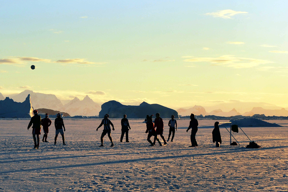 HMS Protector's ship's company playing football 