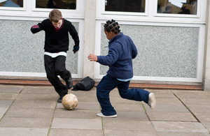 Boys playing football