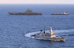 HMS Defender with the Russian aircraft carrier Admiral Kuznetsov and a resupply ship [Picture: Crown copyright]