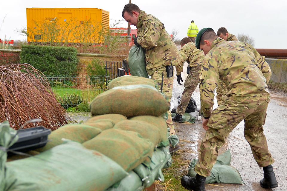 Royal Marines laying sandbags