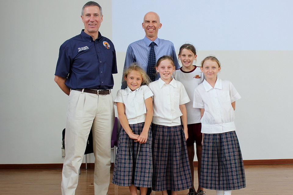 Andy Green with students at JIS