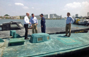 Colombian Defence Minister, shows the Foreign Secretary boats, captured by Colombian naval forces, that used to be used to smuggle drugs.