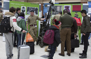 A soldier from 101 Engineer Regiment demonstrates a bomb disposal robot at the exhibition [Picture: Petty Officer (Photographer) Derek Wade, Crown copyright]