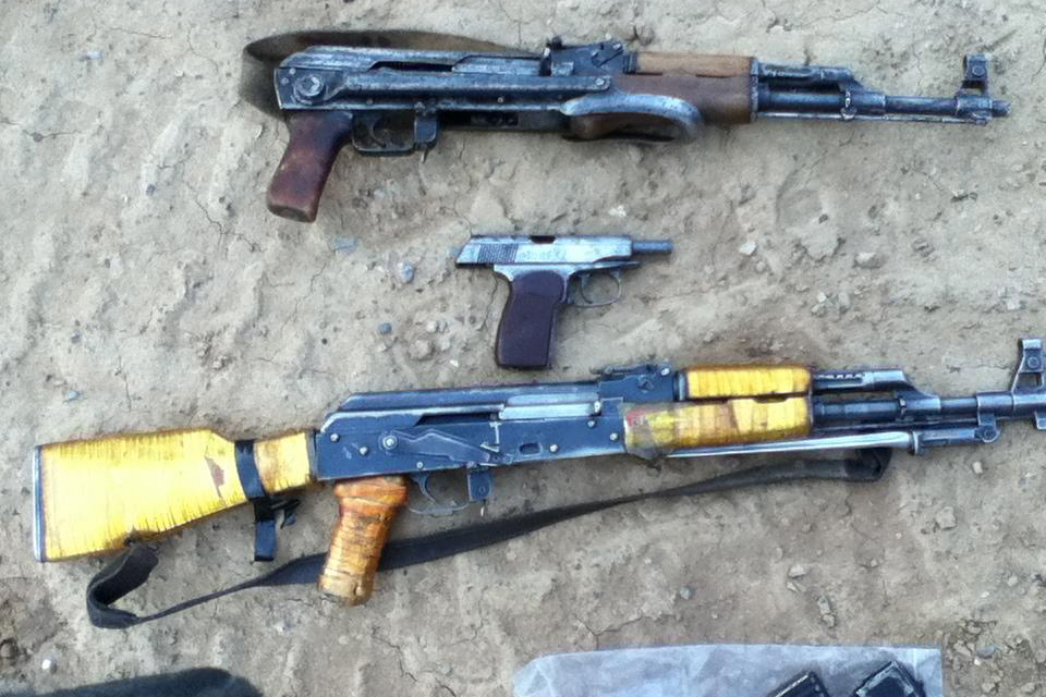 Two assault rifles and a pistol