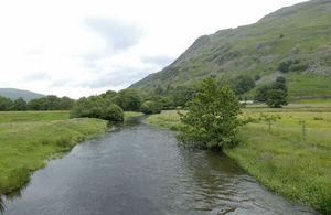 A river runs through fields