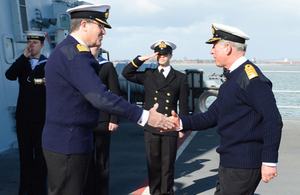 Captain Iain Lower welcomes the Prince of Wales on board HMS Dragon [Picture: Leading Airman (Photographer) Maxine Davies, Crown copyright]