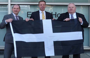 Stephens Williams, Stephen Gilbert and Eric Pickles with the Cornwall flag.